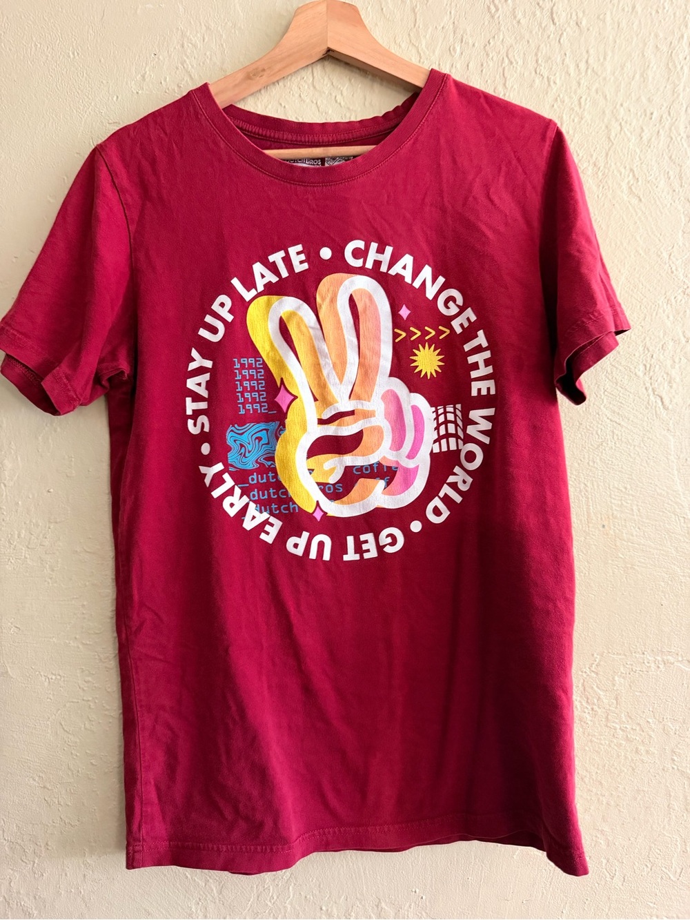 Dutch Bros Burgundy Short Sleeve Tee with Multicolor Peace Hand